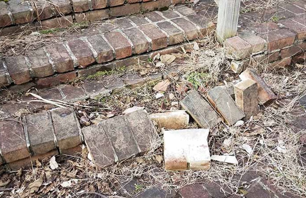 damaged brick steps