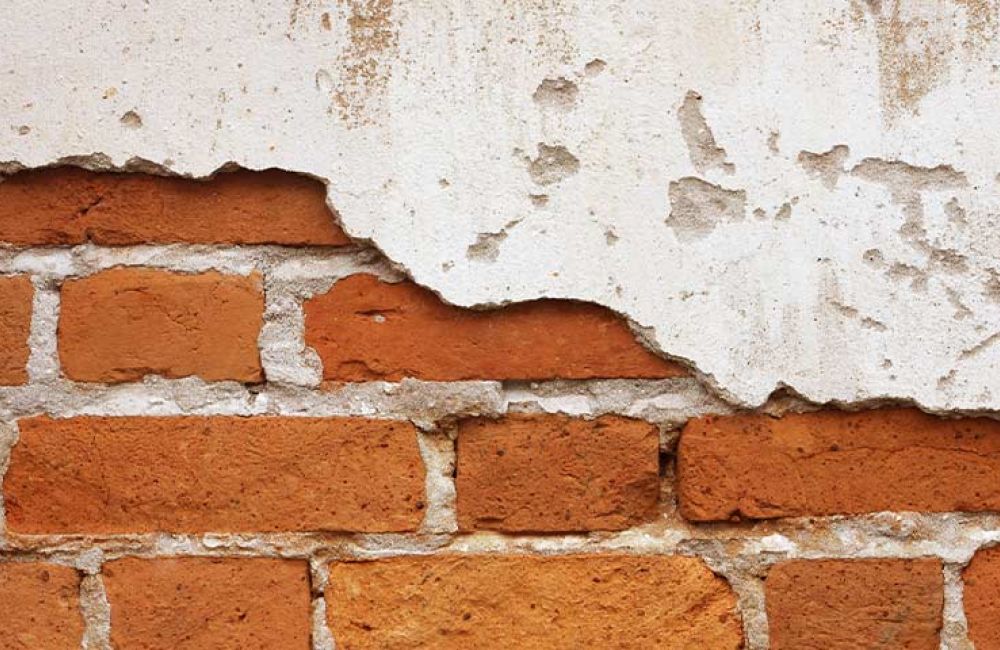 brick underneath drywall