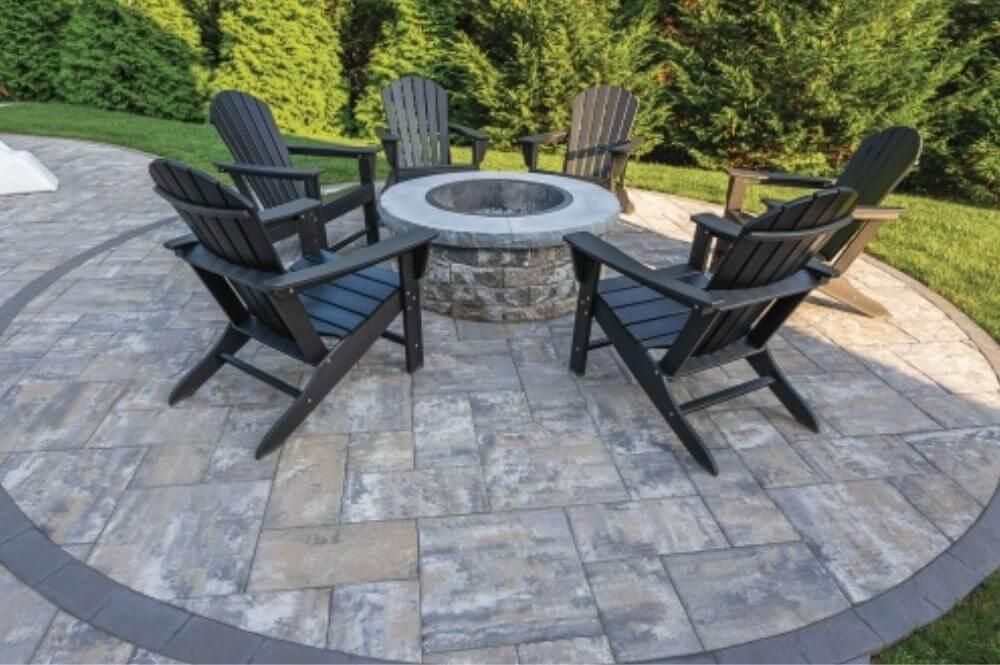 Paver patio with fire pit and chairs