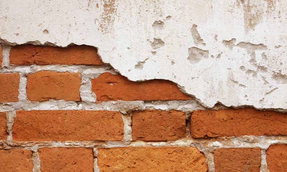 brick underneath drywall