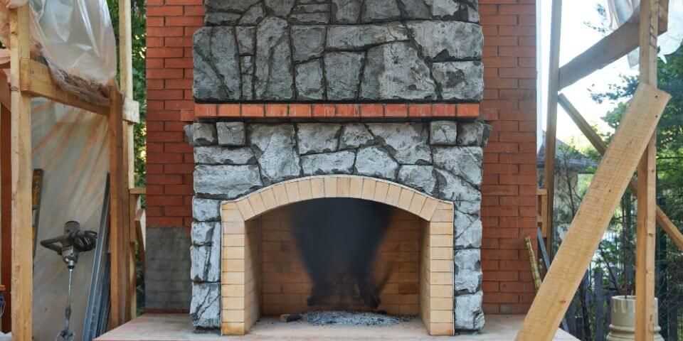 Backyard fireplace in progress