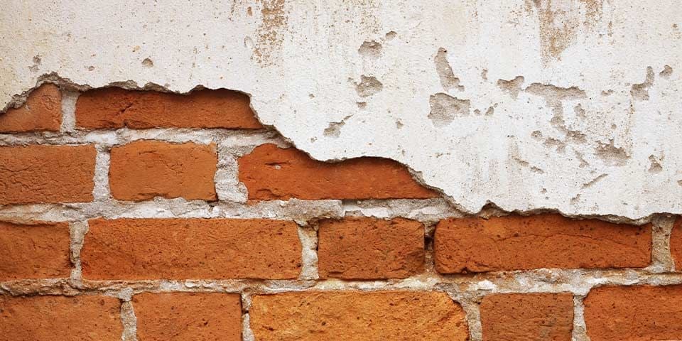 brick underneath drywall