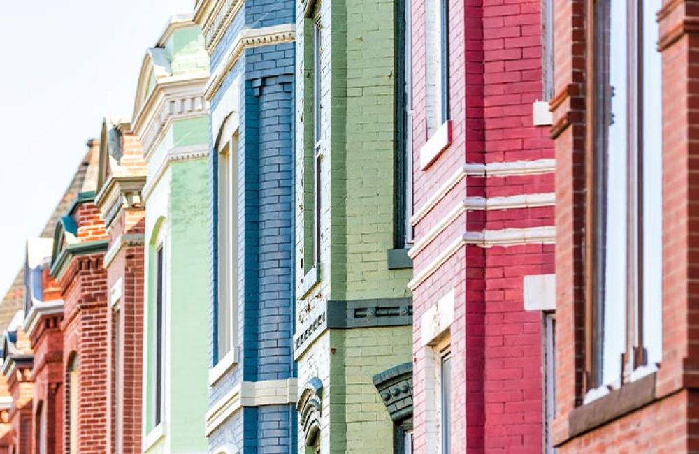multi colored brick houses in a row