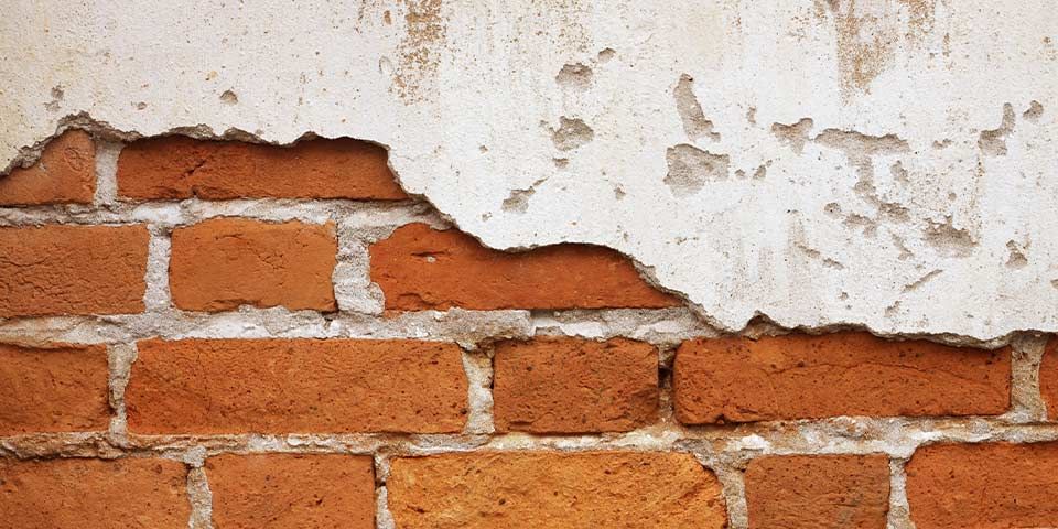 brick underneath drywall