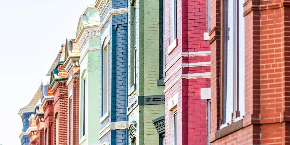 multi colored brick houses in a row