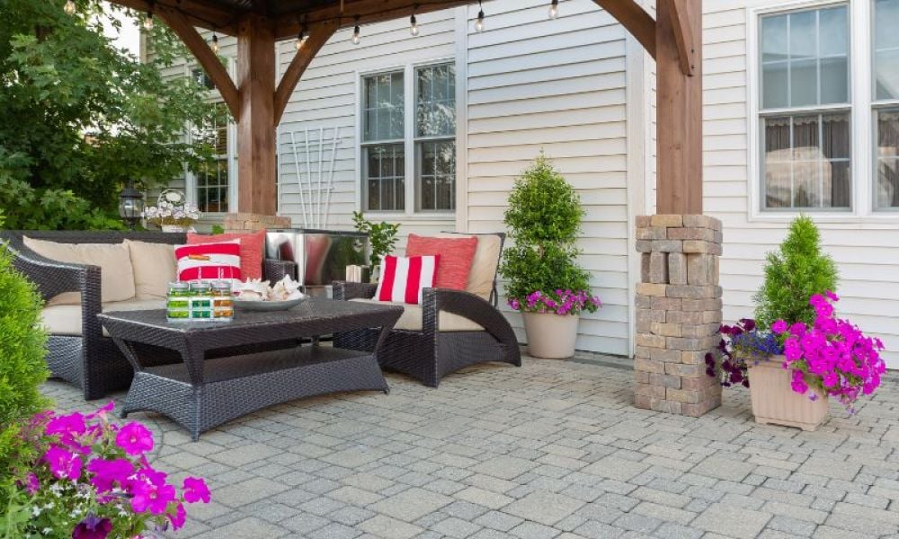image of backyard patio with pergola and brick pavers