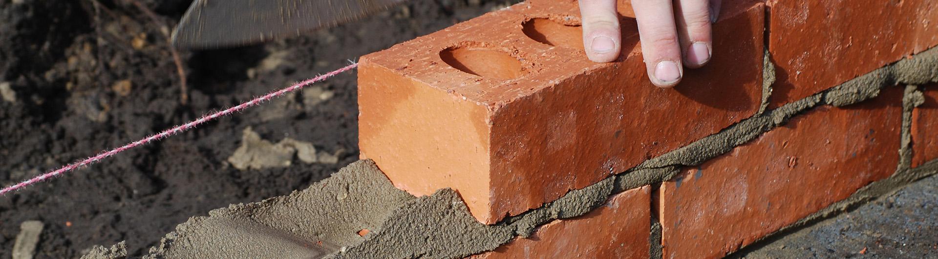 Hand Piling Clay Paver