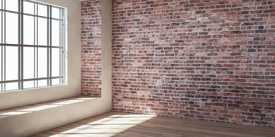 interior of a home with brick walls